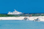 Silver Cloud at a secluded cove in the Bahamas